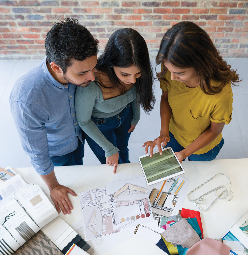 three people looking at finish options